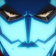 A blue light shines under Flect Turn's face as he frowns directly into the camera.